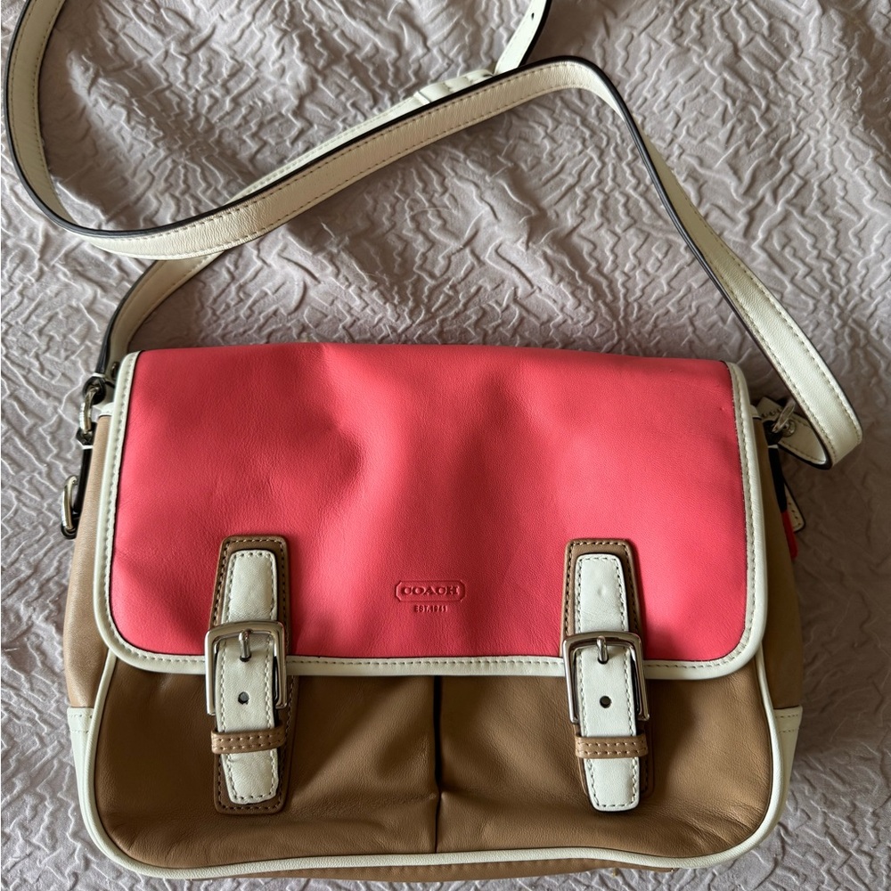 pink, white and tan Coach handbag